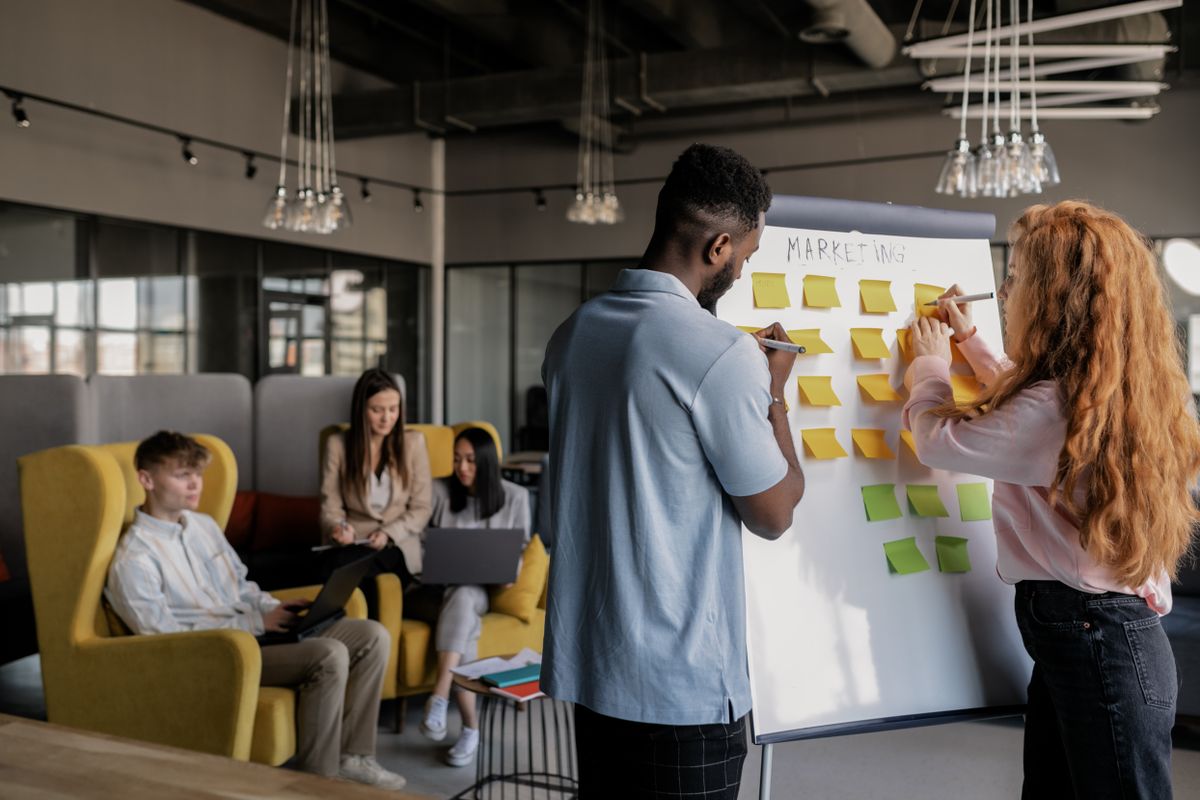 A marketing team reviewing campaign performance together